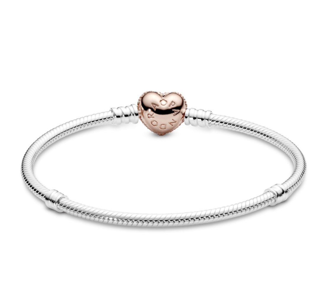 Pulsera corazón brillos oro rosado